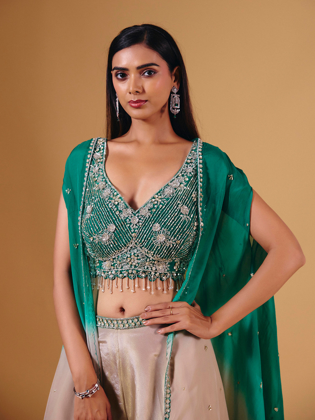 Elegant beige silk palazzo suit with sequins and shrug
