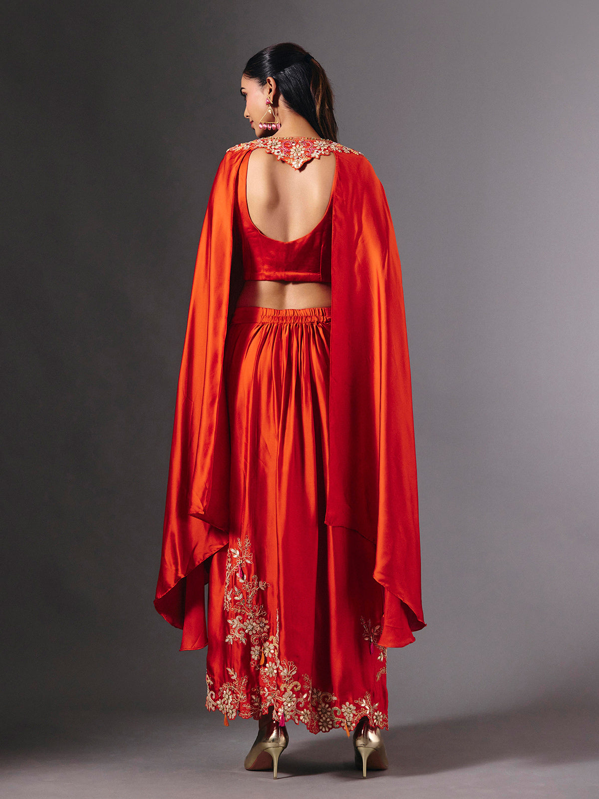 Vibrant orange crepe silk indowestern suit with gota embellishments
