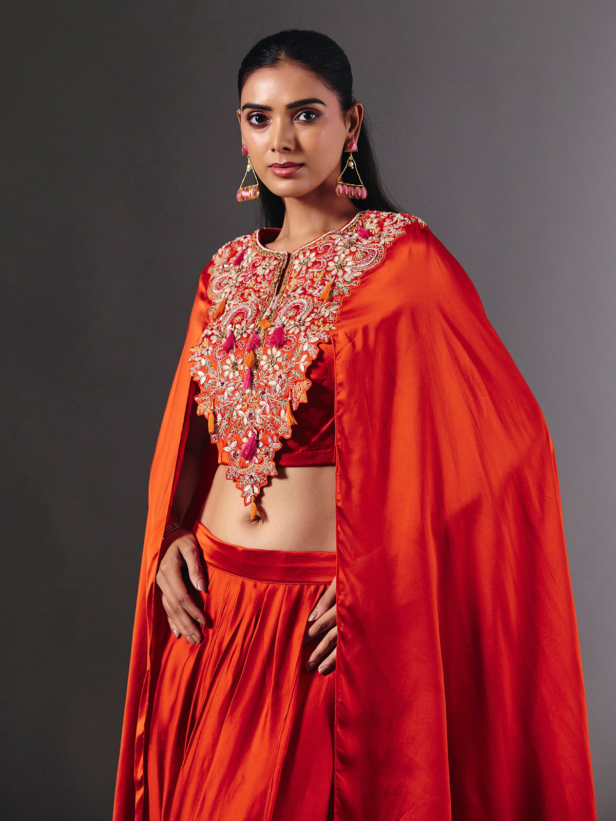 Vibrant orange crepe silk indowestern suit with gota embellishments