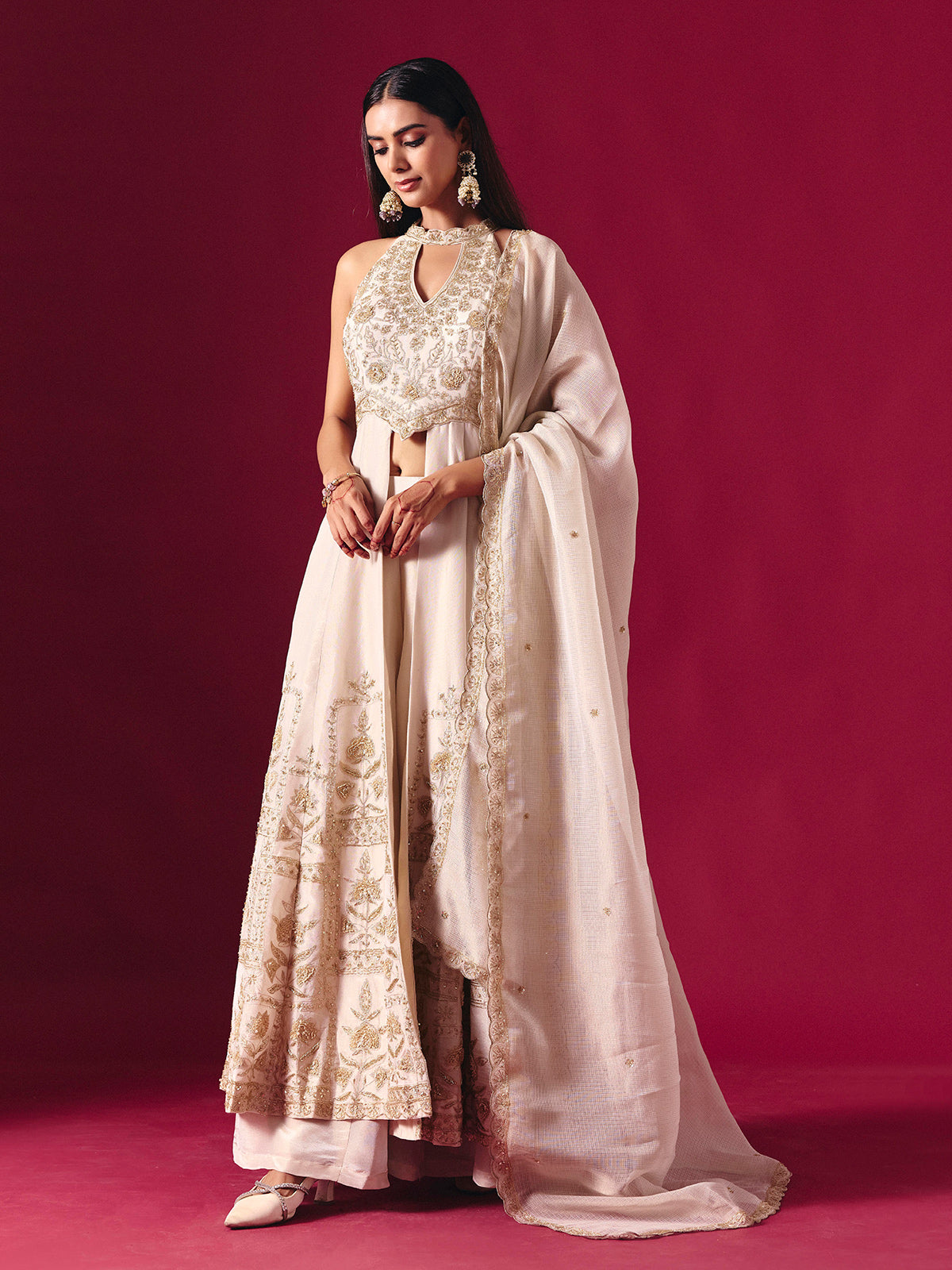 Off white silk embroidered halter neck festive palazzo suit with dupatta