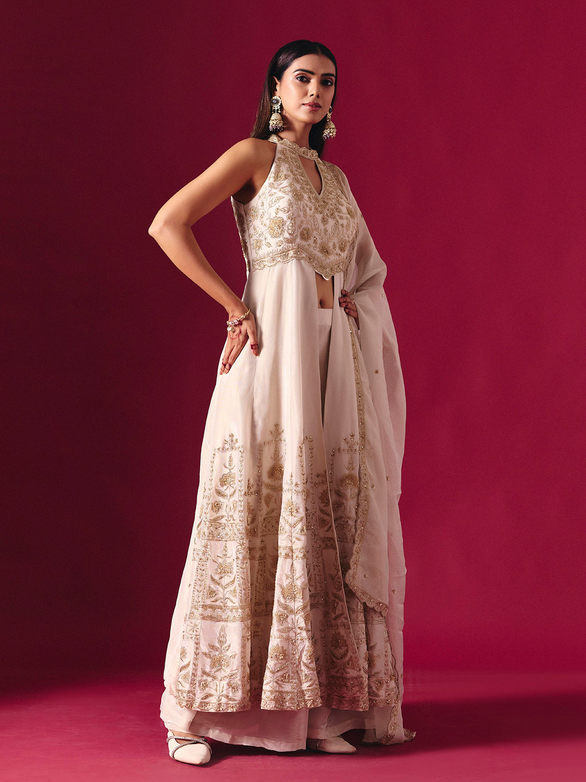 Off white silk embroidered halter neck festive palazzo suit with dupatta