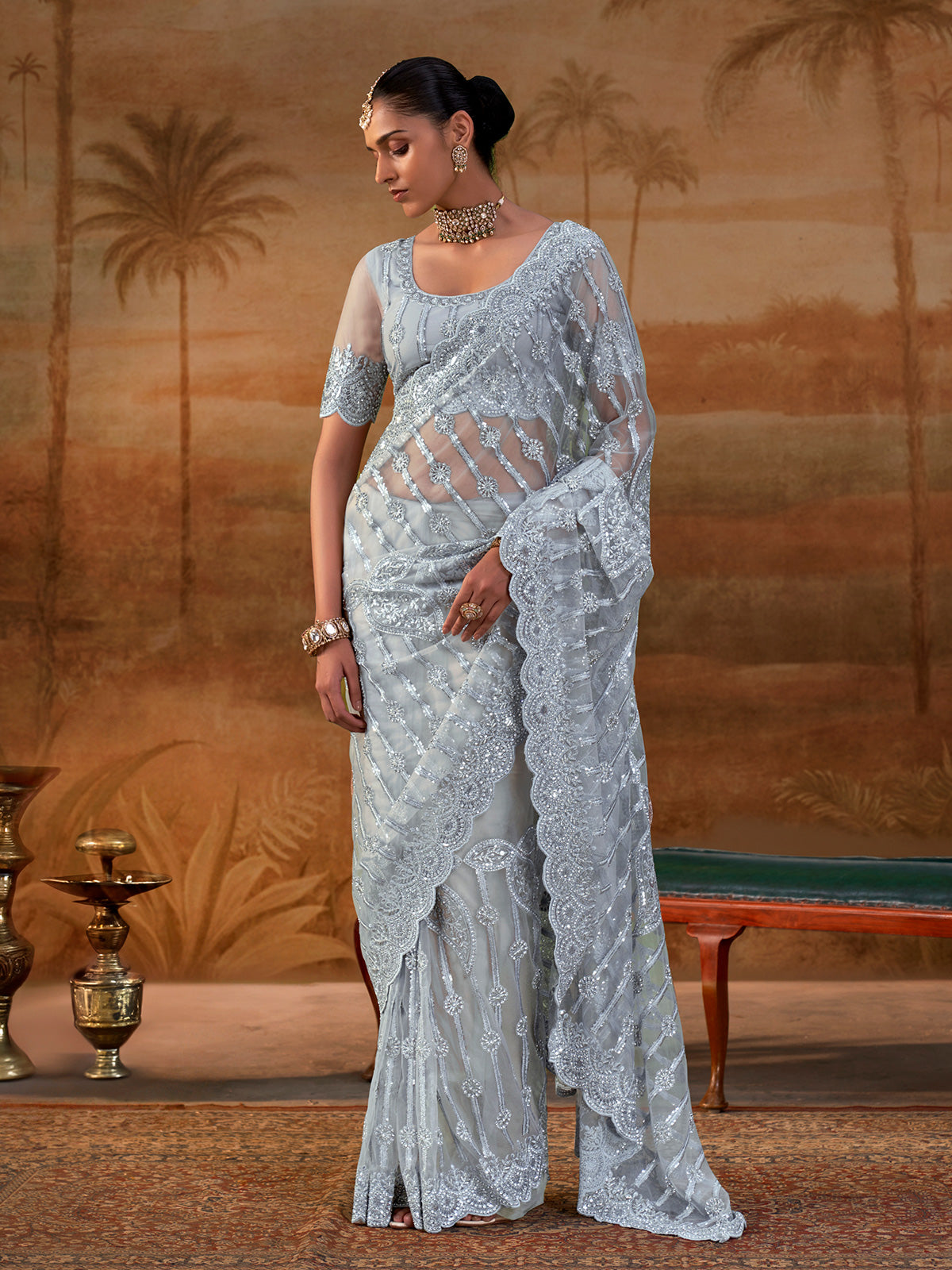 Sky blue net womens embellished saree with unstitched blouse