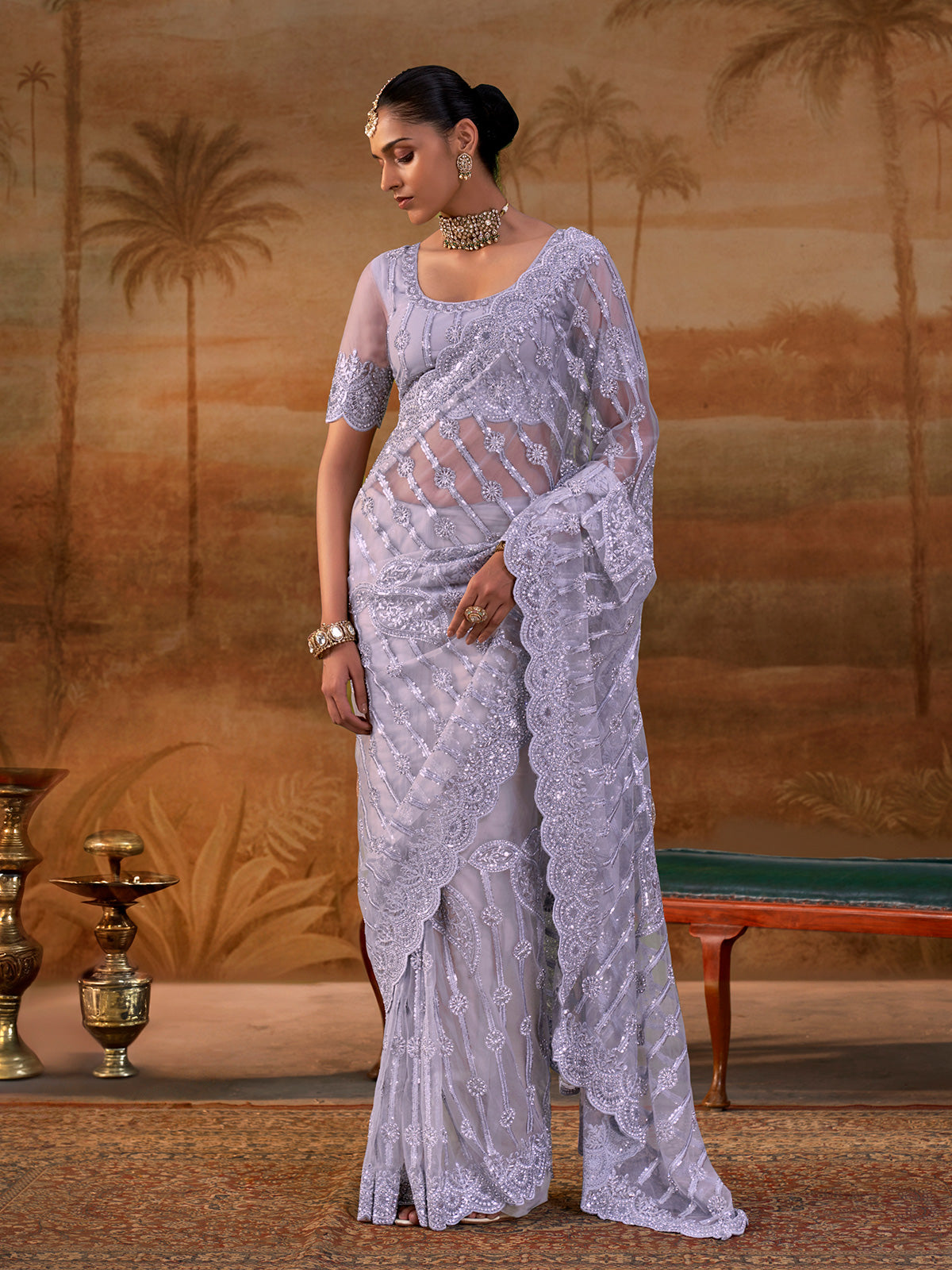 Purple net womens embellished saree with unstitched blouse