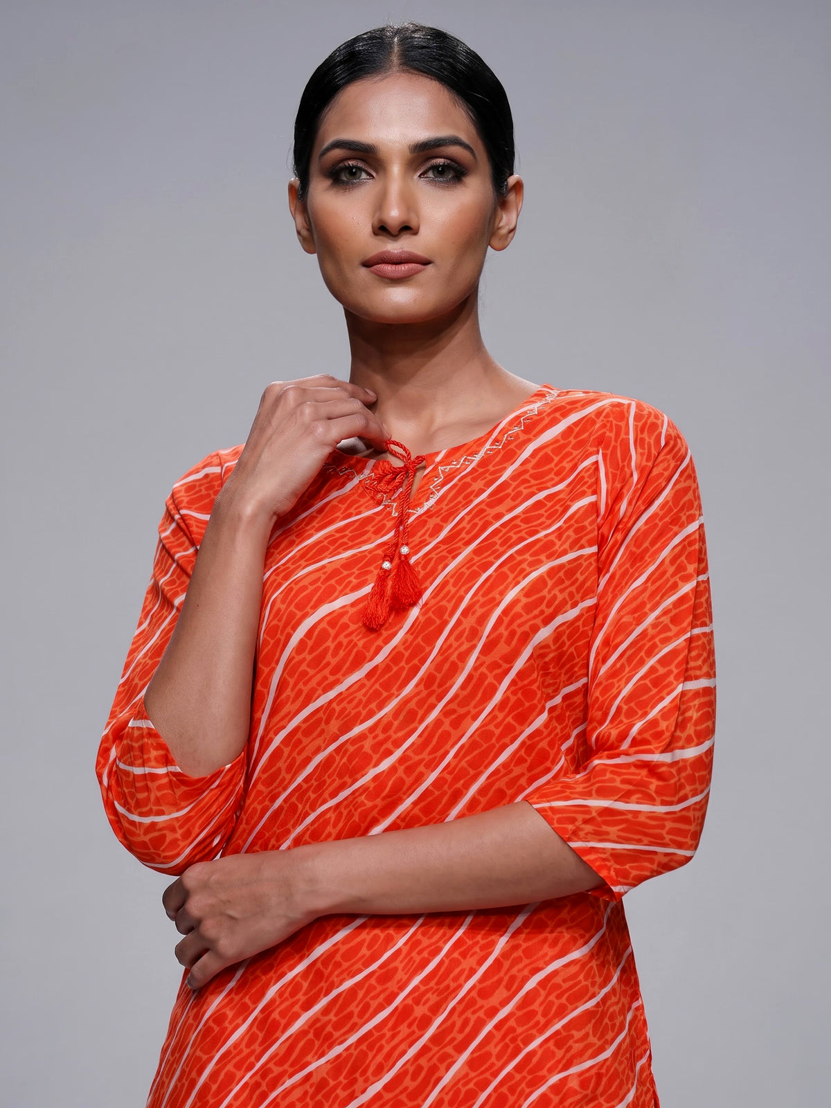 Orange silk printed kurti set with elegant dupatta