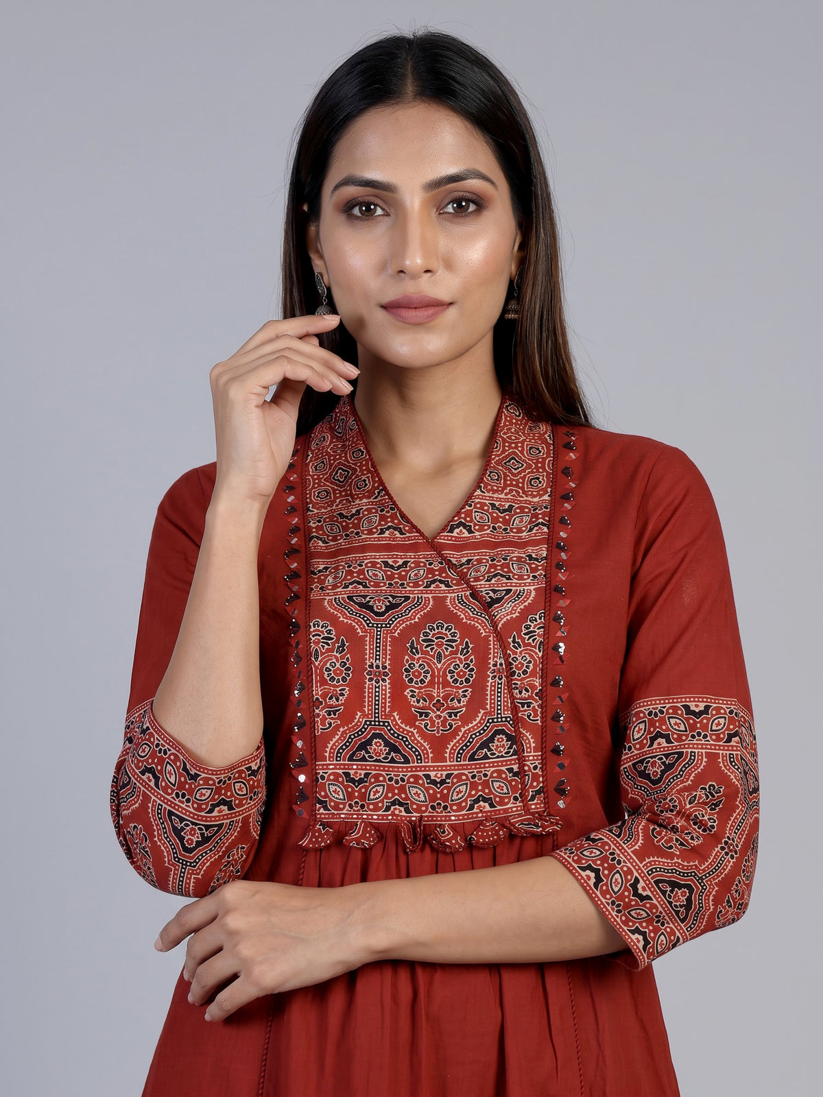 Rust red cotton blend anarkali kurti set with festive embellishments