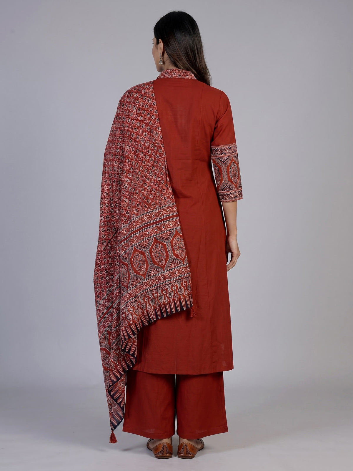 Rust red cotton blend anarkali kurti set with festive embellishments