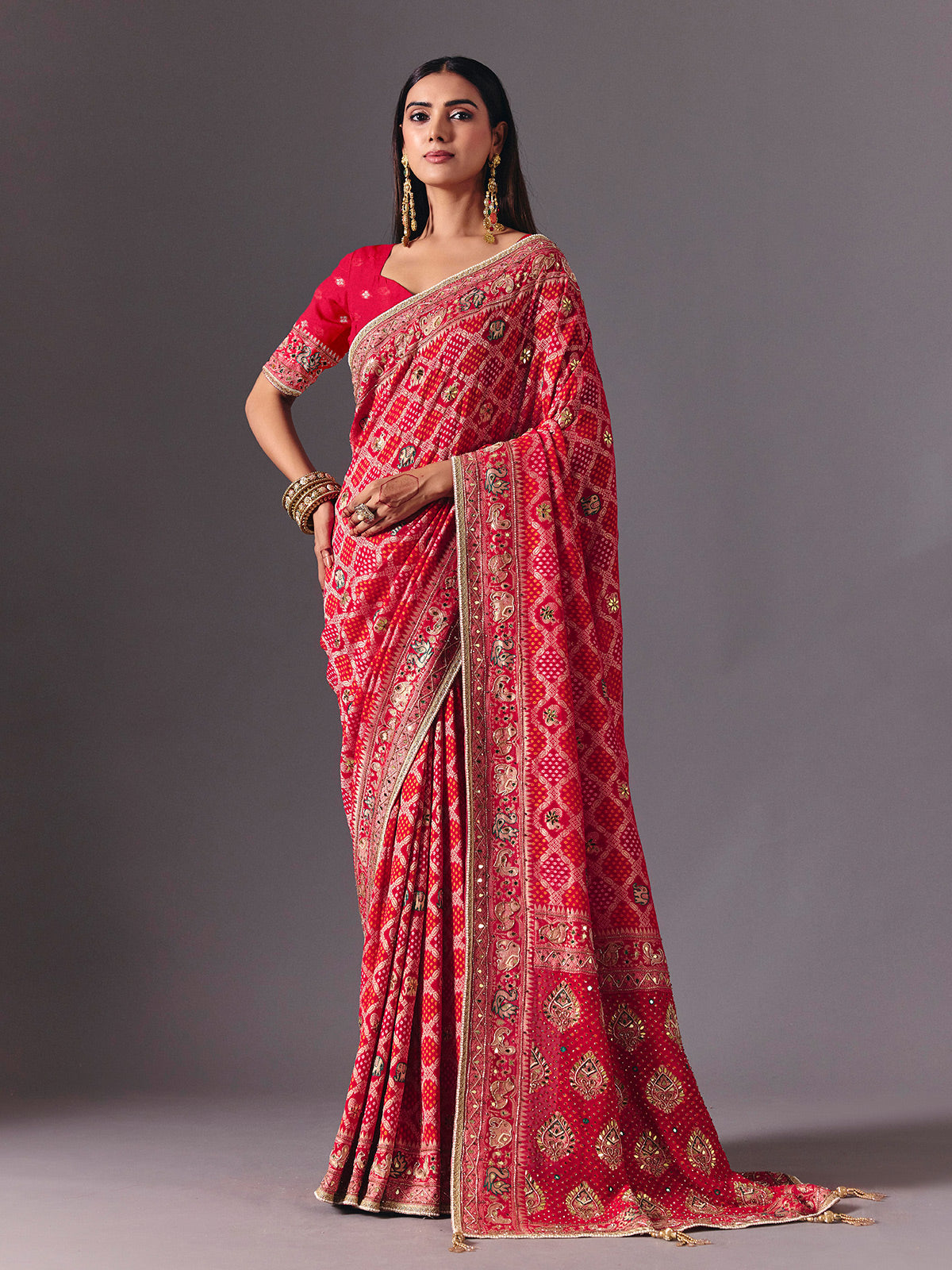 Rani pink georgette saree with bird motif elegance