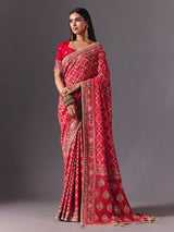 Rani pink georgette saree with bird motif elegance