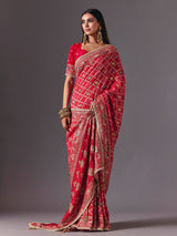 Rani pink georgette saree with bird motif elegance