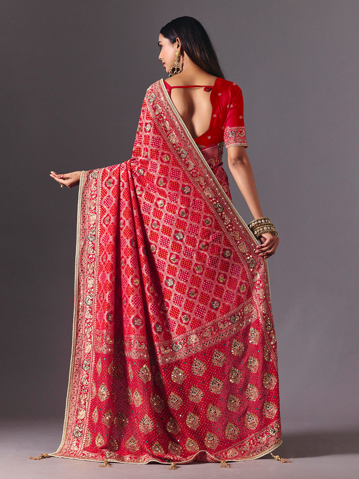 Rani pink georgette saree with bird motif elegance