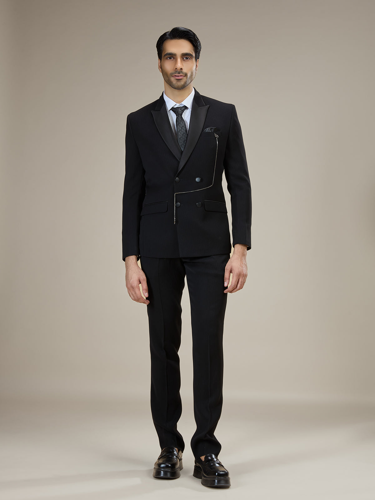 Black textured double breasted coat suit with chain detail