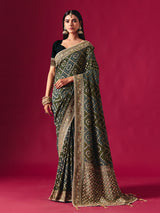 Green georgette saree with festive embellishments