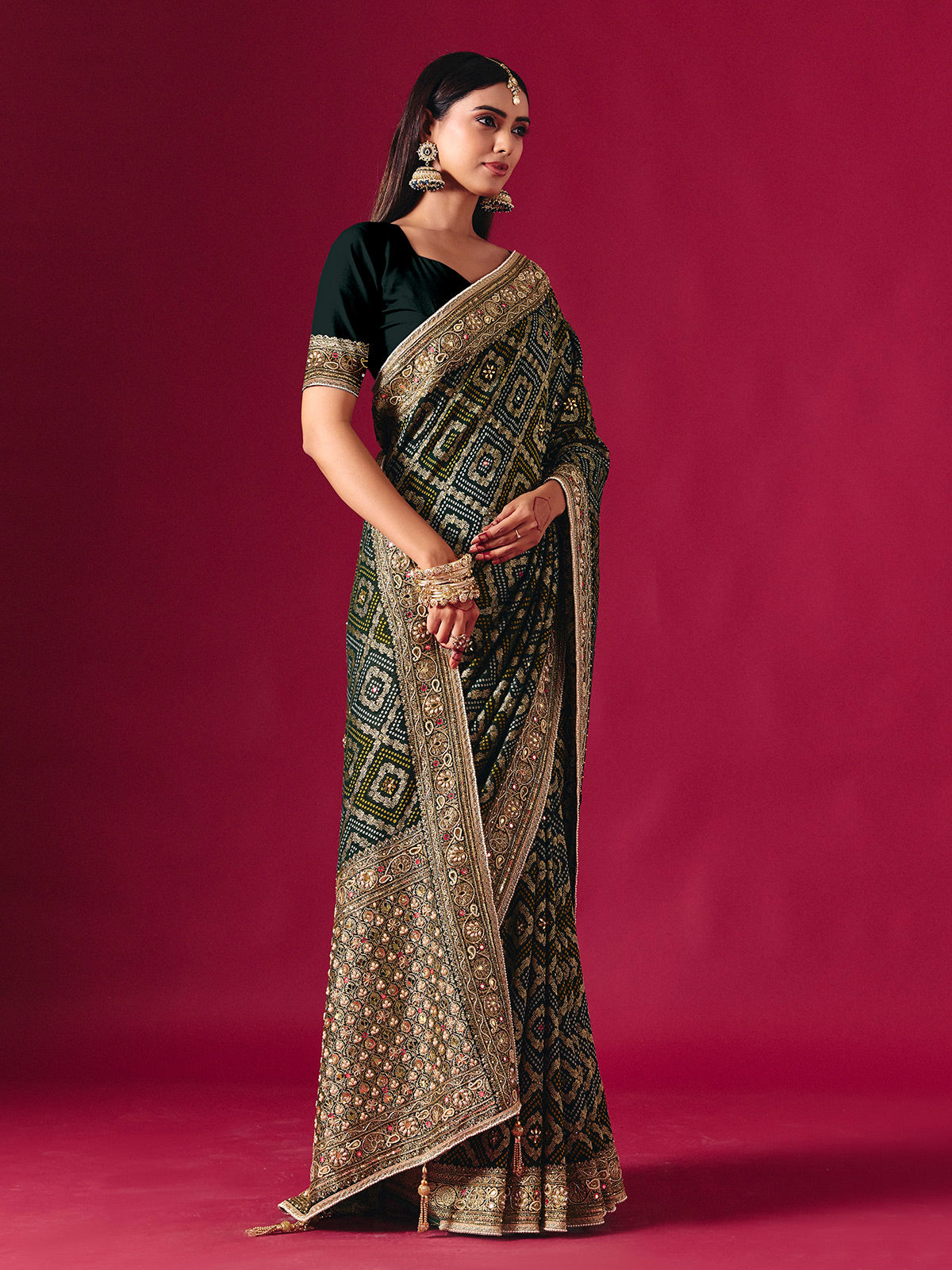 Green georgette saree with festive embellishments