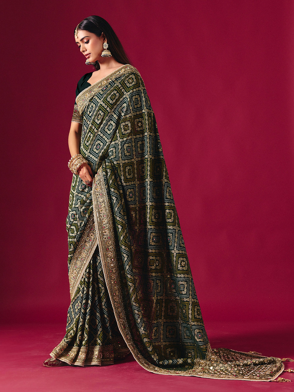 Green georgette saree with festive embellishments