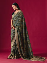Green georgette saree with festive embellishments