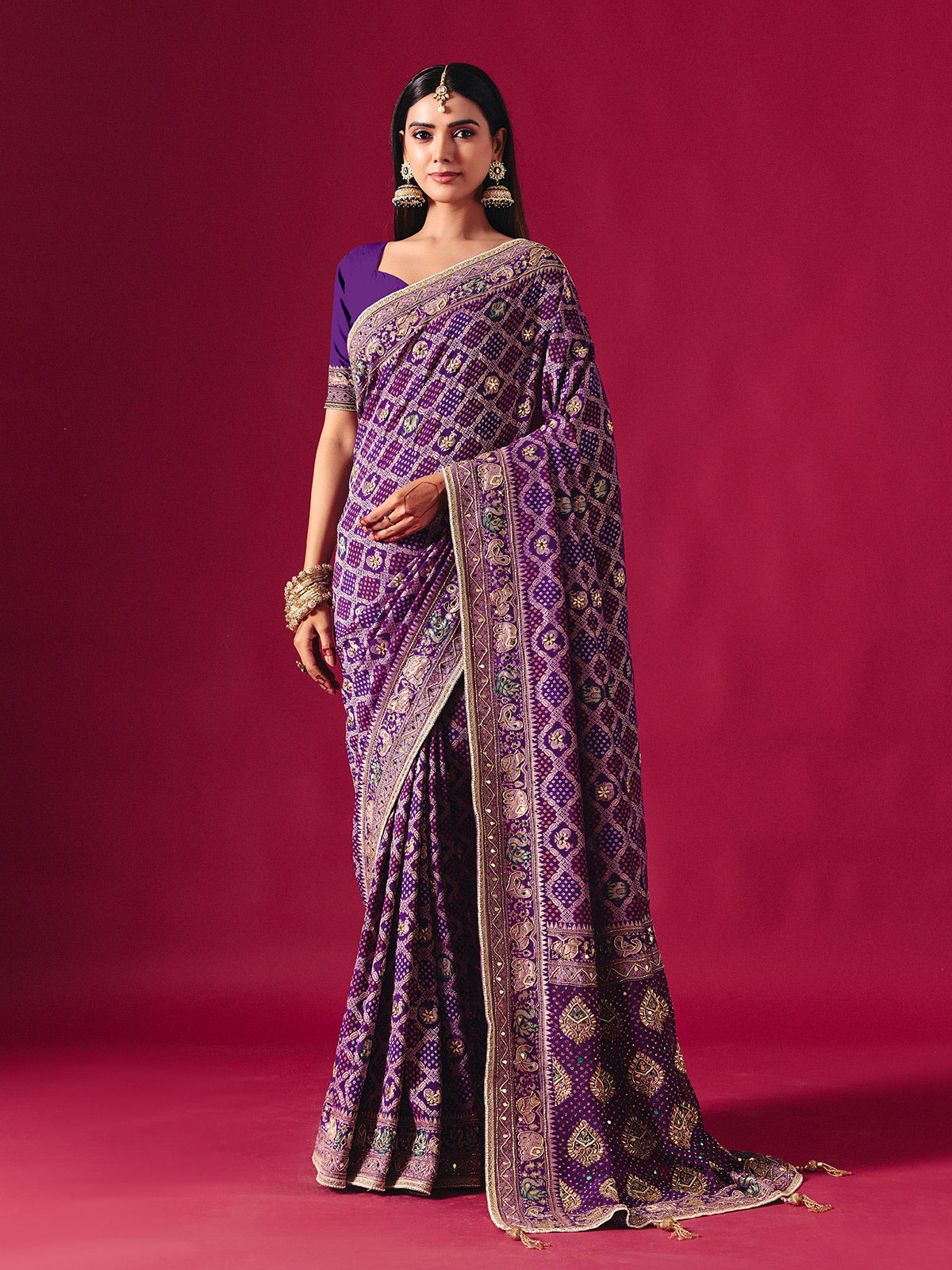 Purple georgette saree with elegant bandhani artistry