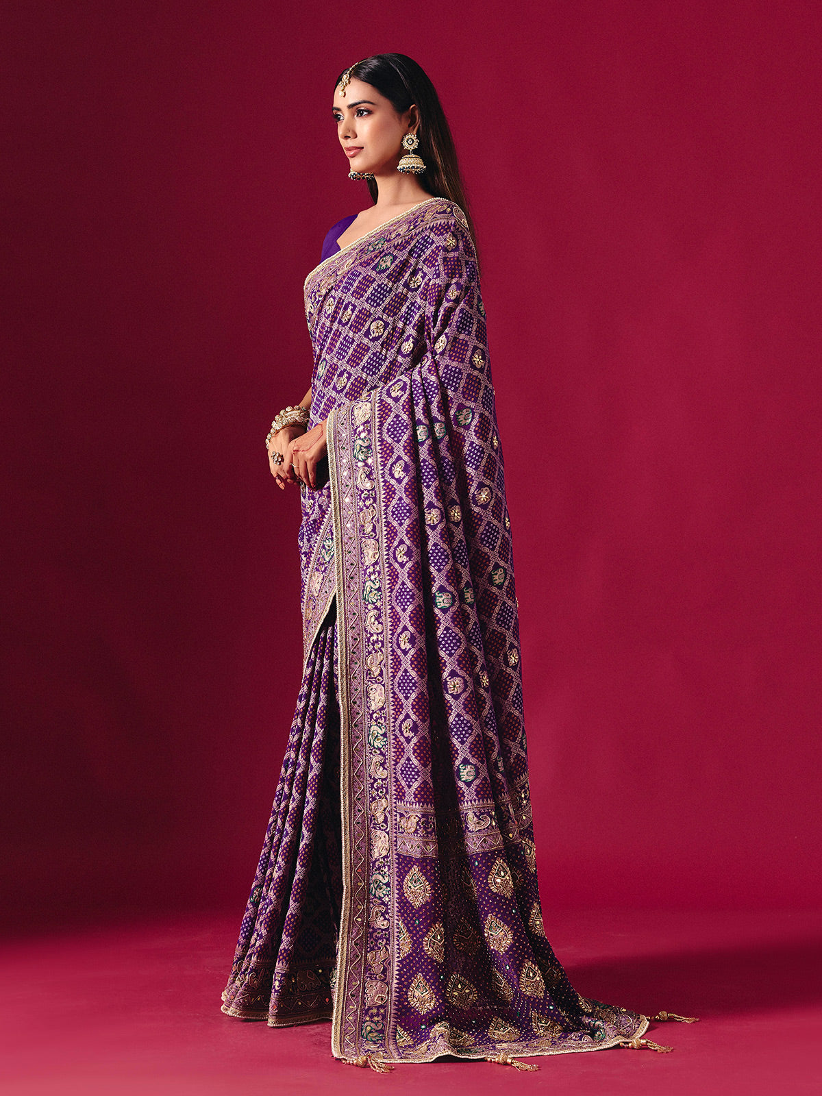 Purple georgette saree with elegant bandhani artistry