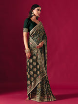 Green georgette saree with traditional handcrafted detailing