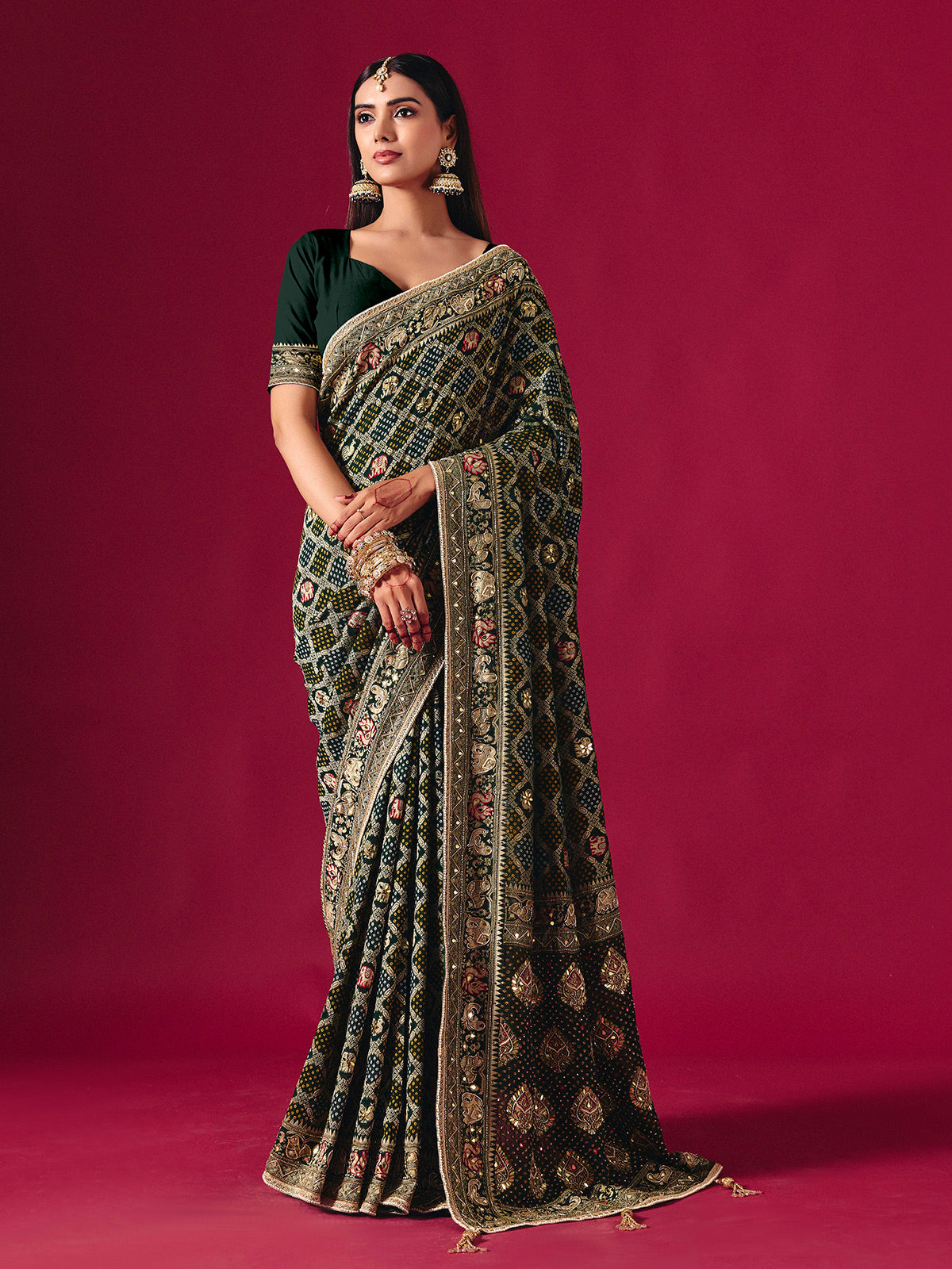 Green georgette saree with traditional handcrafted detailing