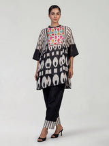 Black silk salwar suit with bandhgala neckline and ornamental detailing