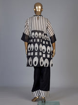 Black silk salwar suit with bandhgala neckline and ornamental detailing