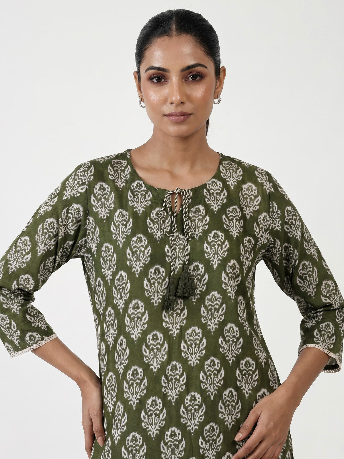 Graceful mehendi green silk kurti set with intricate cutwork