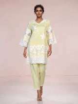 Radiant yellow cotton blend kurti set with pearls and cutwork