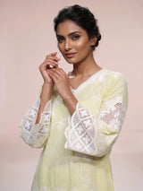 Radiant yellow cotton blend kurti set with pearls and cutwork