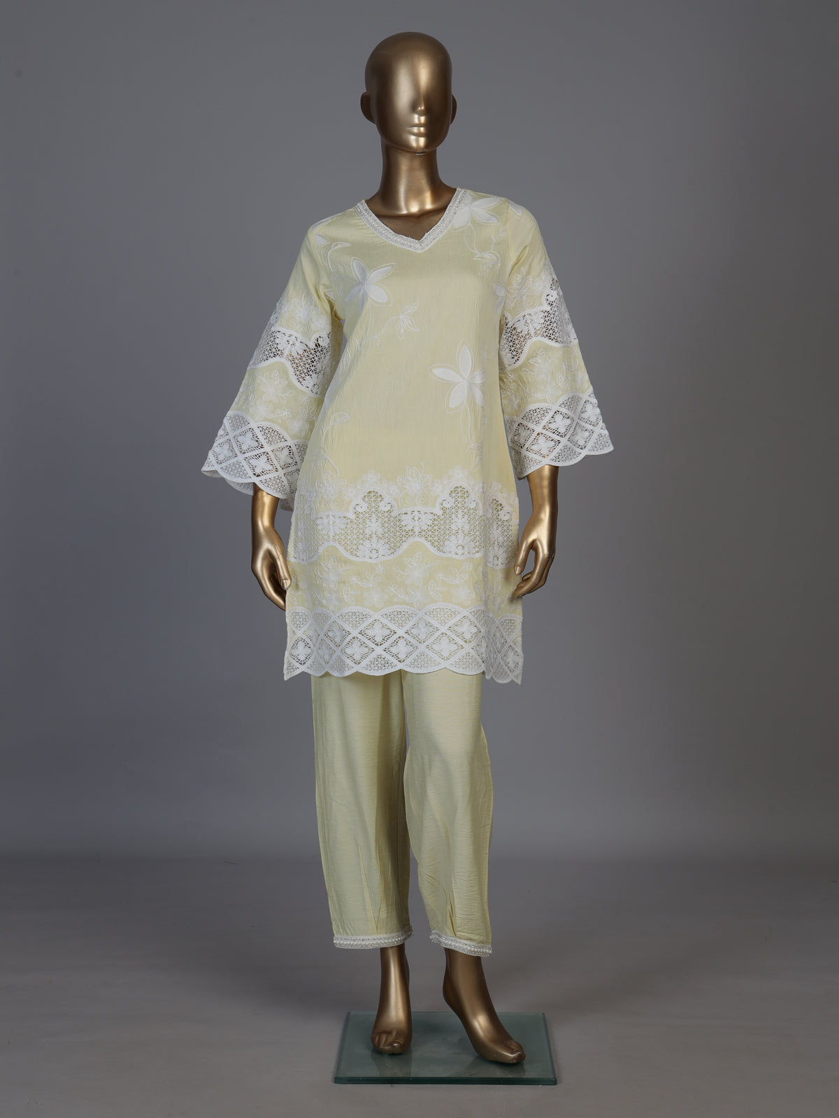 Radiant yellow cotton blend kurti set with pearls and cutwork