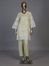 Radiant yellow cotton blend kurti set with pearls and cutwork