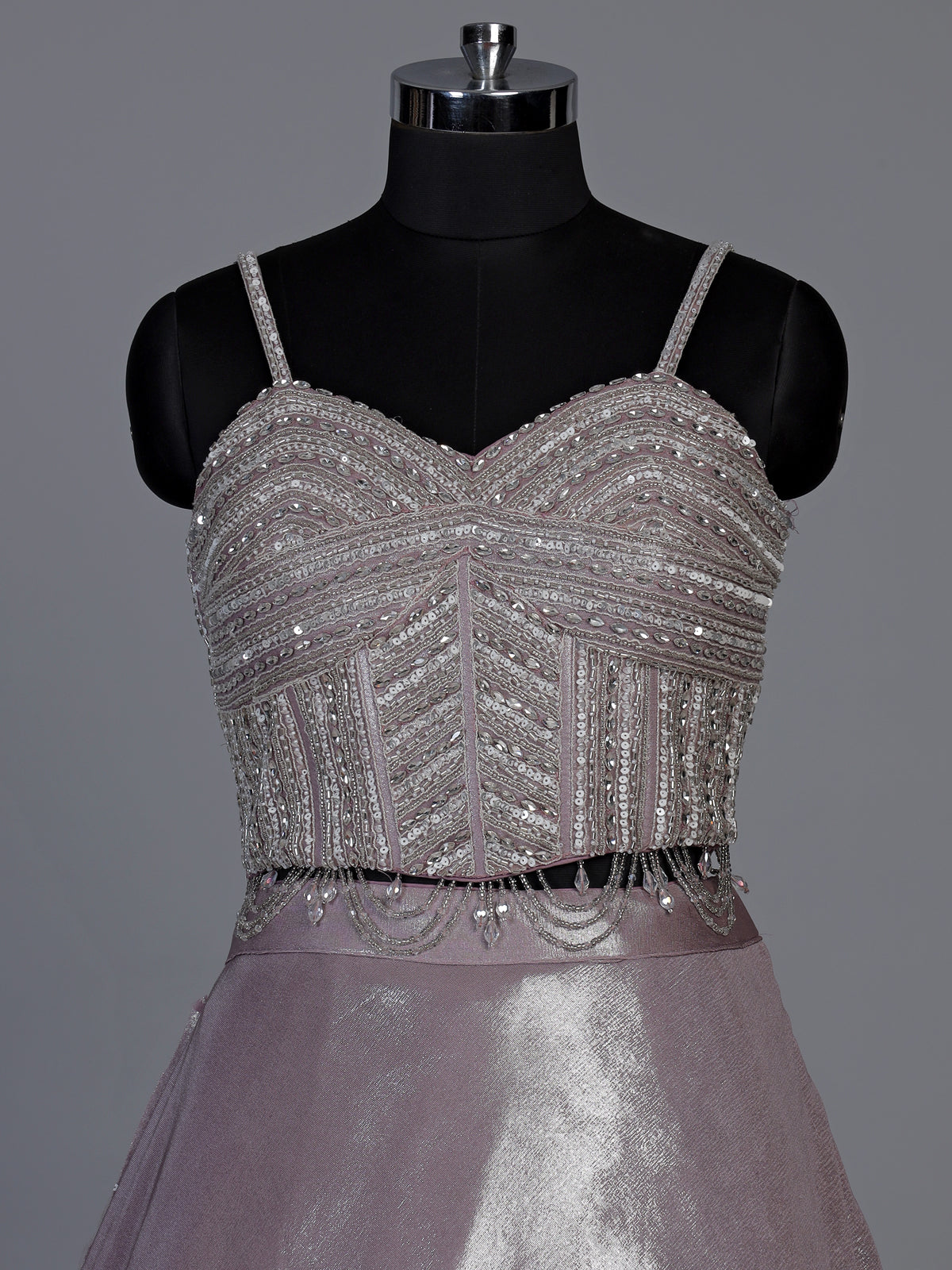 Elegant pink shimmer tissue silk lehenga choli with attached dupatta