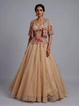 Beige organza tissue lehenga choli with embroidered jacket detailing