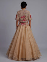 Beige organza tissue lehenga choli with embroidered jacket detailing