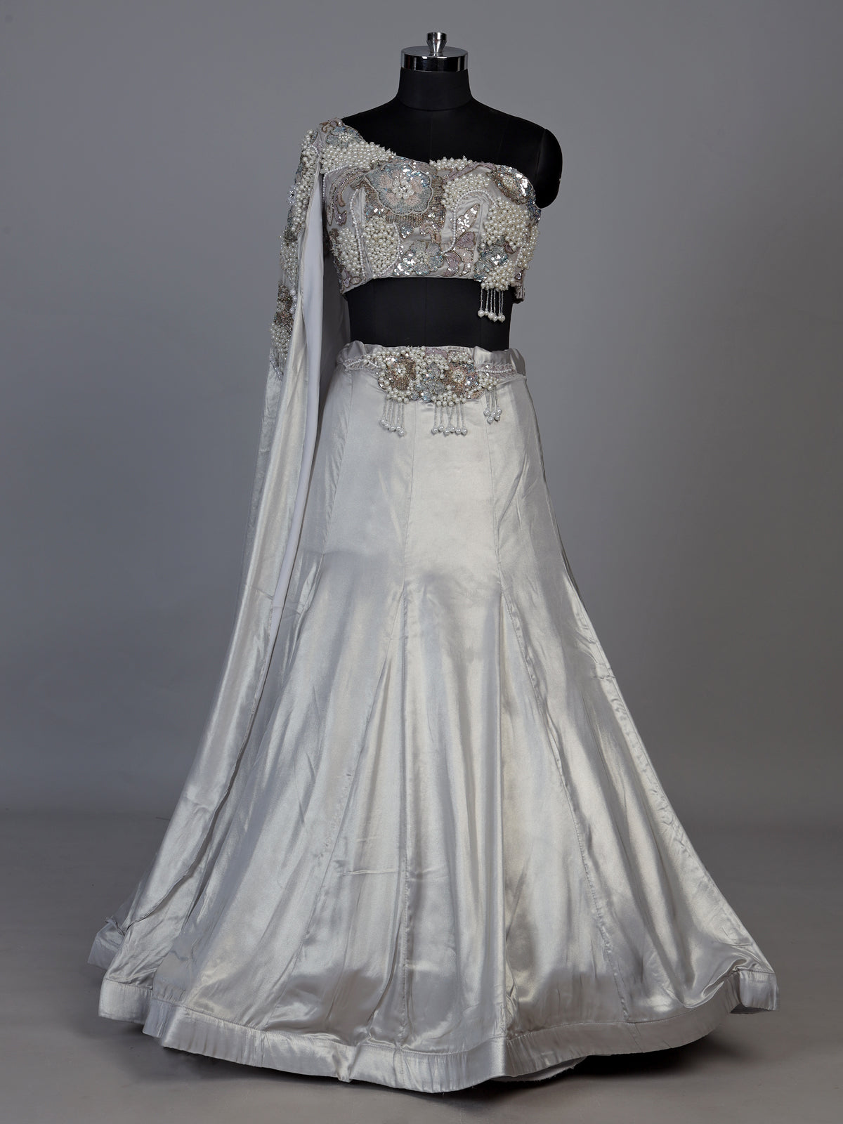 Elegant light grey satin silk lehenga choli with sparkling accents