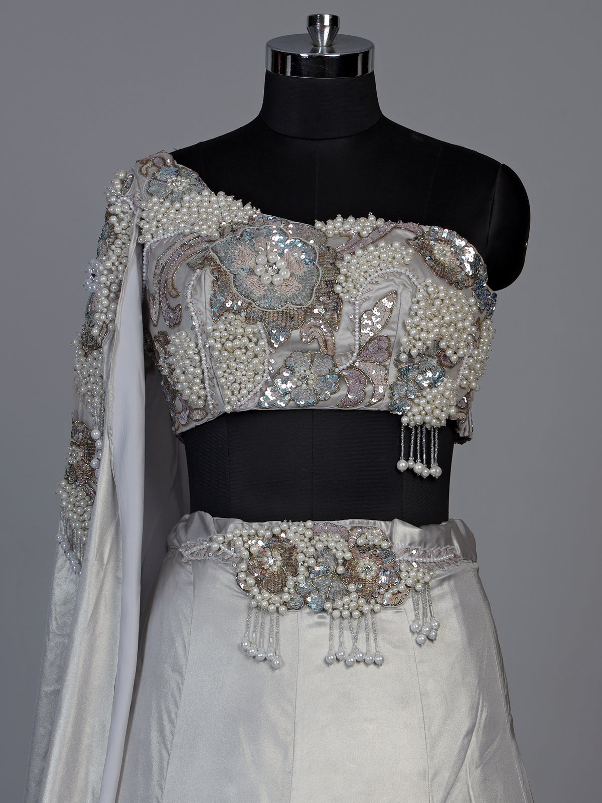 Elegant light grey satin silk lehenga choli with sparkling accents