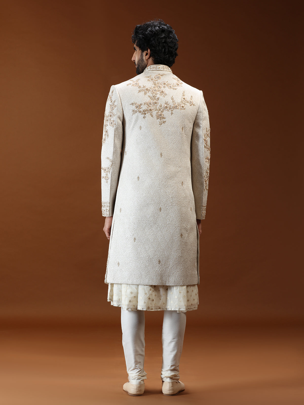 Cream silk mens sherwani with botanical embroidery