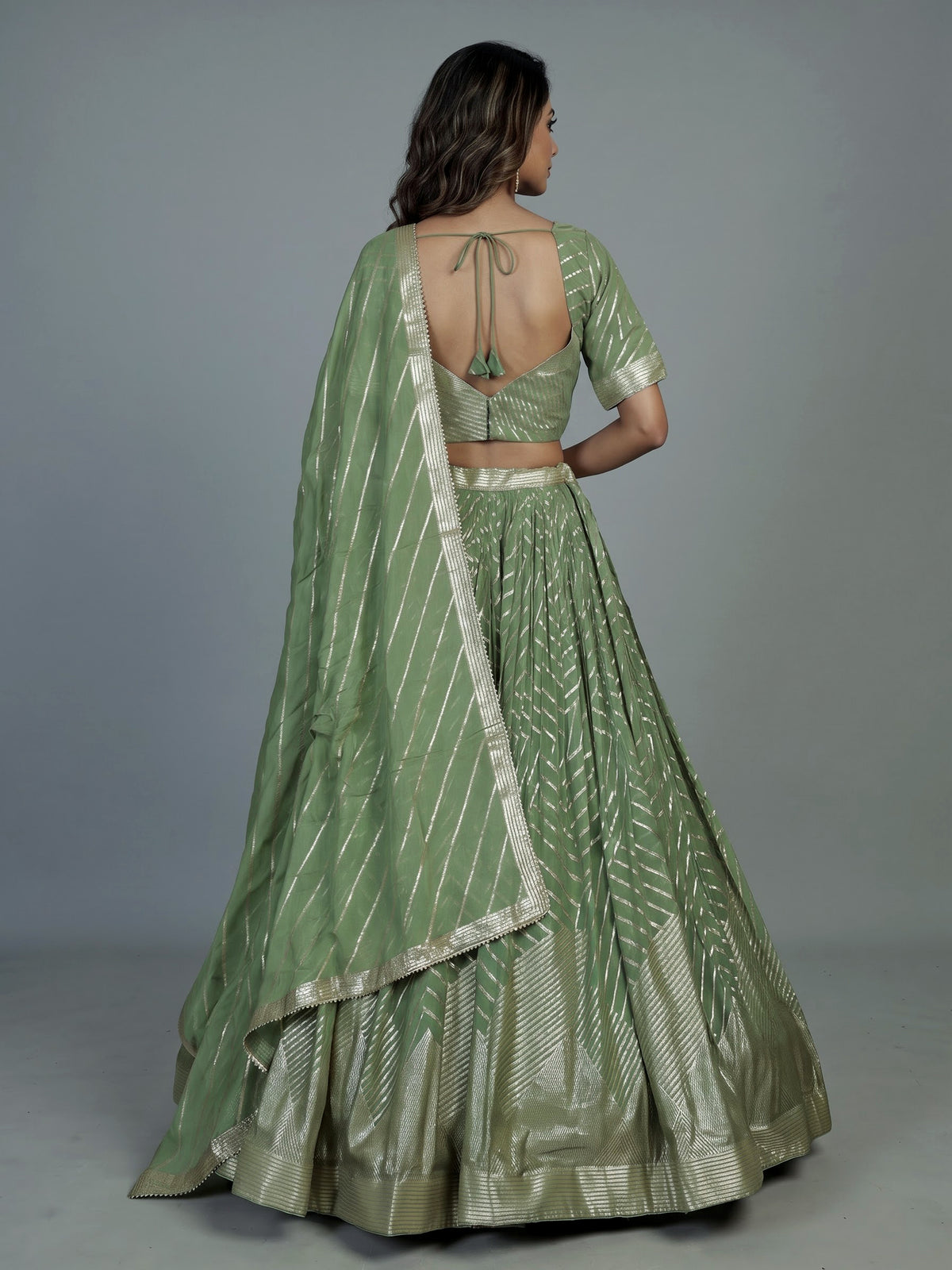 Pista green zari embellished women’s georgette lehenga choli