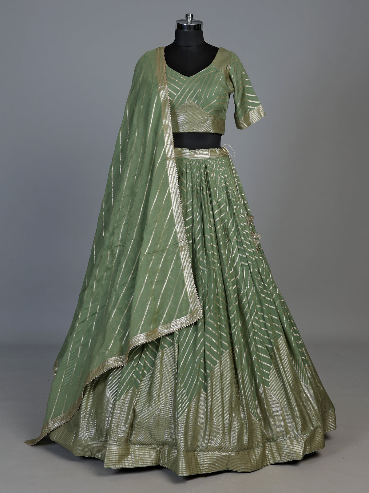 Pista green zari embellished women’s georgette lehenga choli