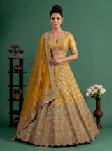 Mustard yellow cutdana zari embellished women’s raw silk lehenga choli