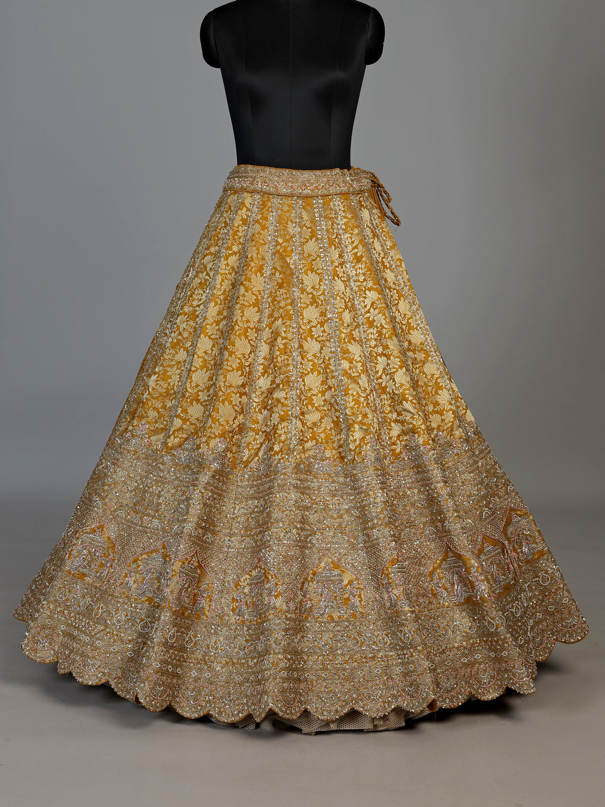 Mustard yellow cutdana zari embellished women’s raw silk lehenga choli
