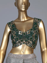 Green shaded sequin fabric saree with embellished tassel pallu