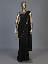 Black silk designer saree with elegant coin embellishments