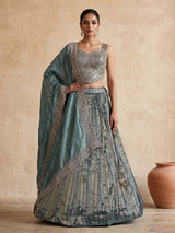 Pastel green tissue silk lehenga choli with festive embellishments