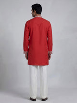 Orange silk blend mens kurta suit with floral neck style