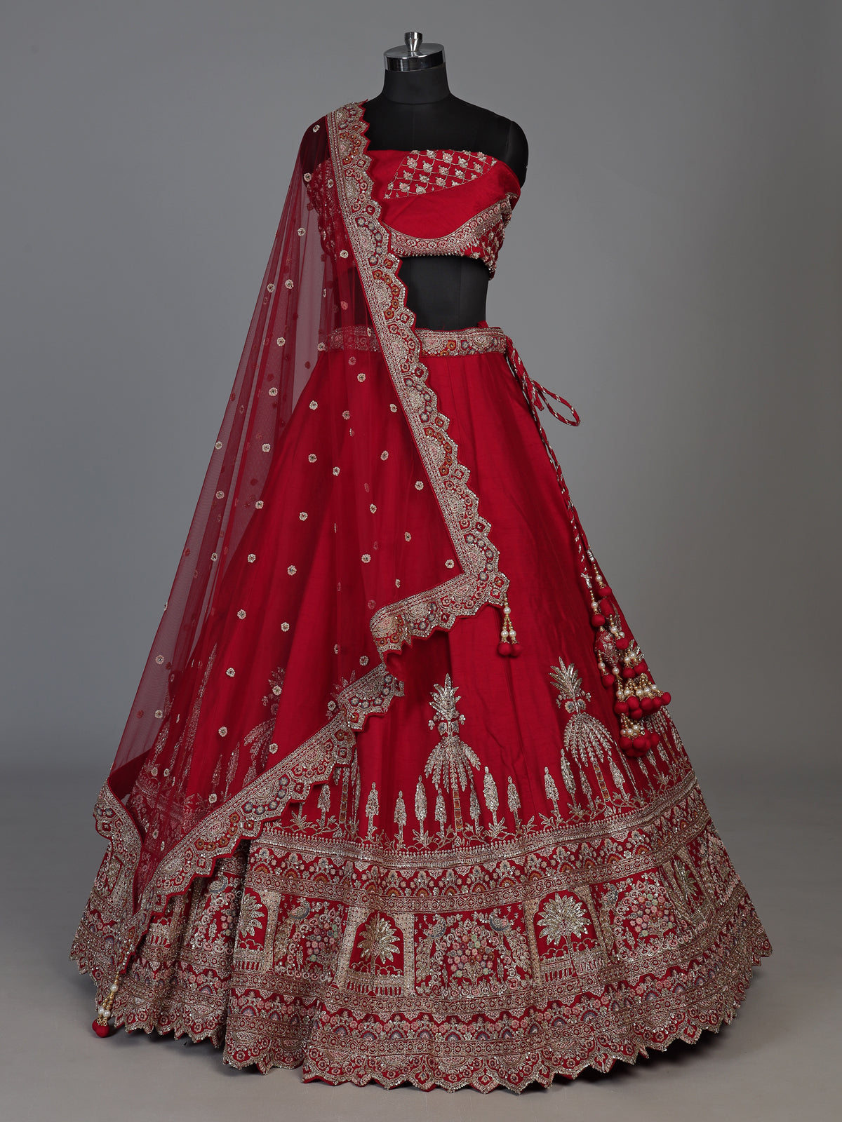 Red raw silk bridal lehenga choli with mughal motifs