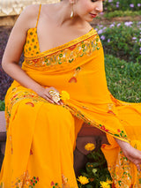 Yellow georgette saree with printed stone detailing