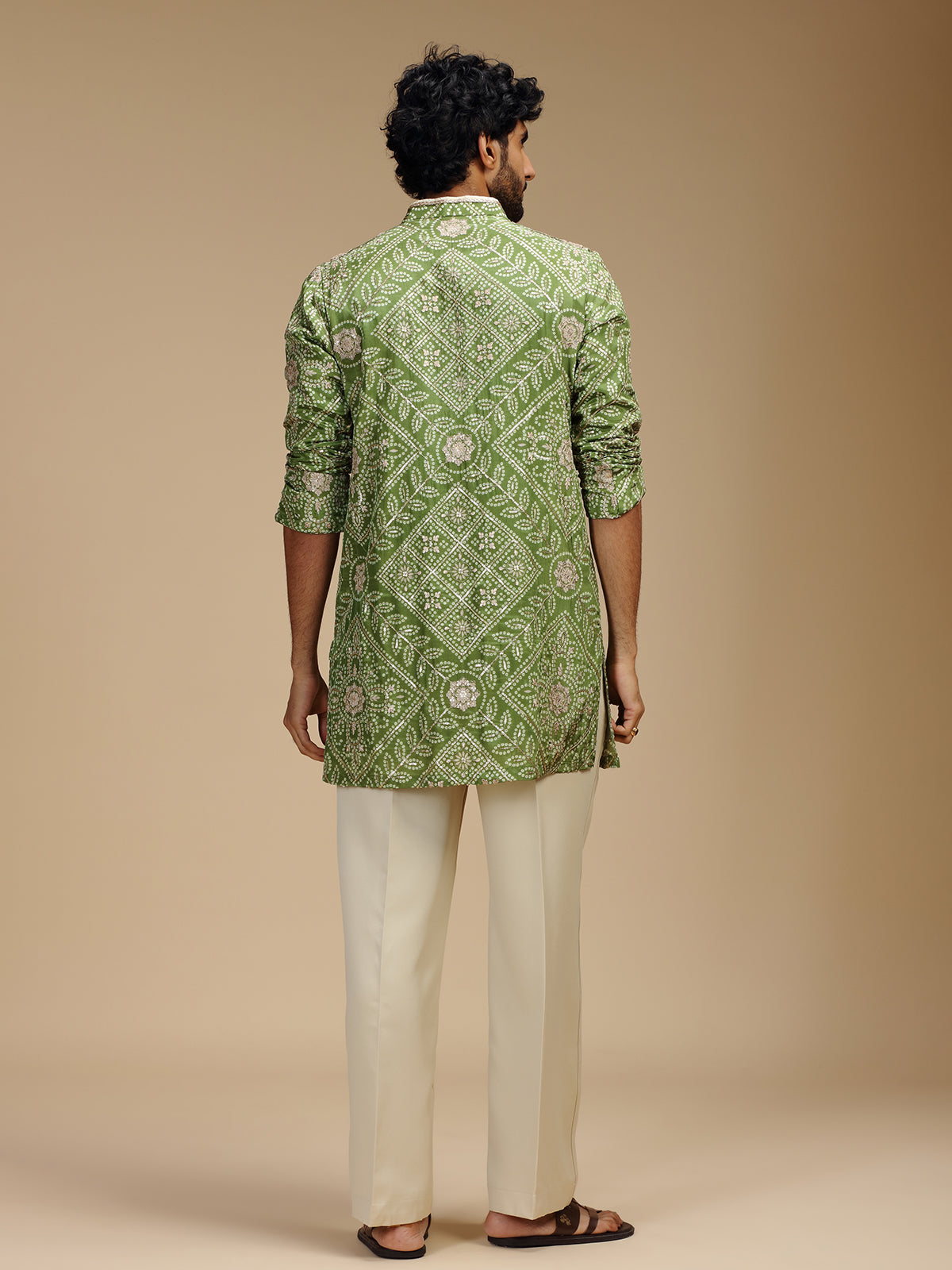 Green pure crepe mens kurta suit with floral medallions