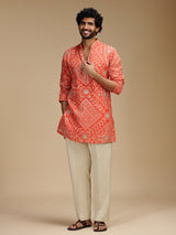 Orange pure crepe mens kurta suit with bandhani design