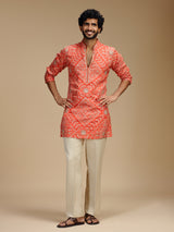 Orange art silk mens kurta suit with bandhani design