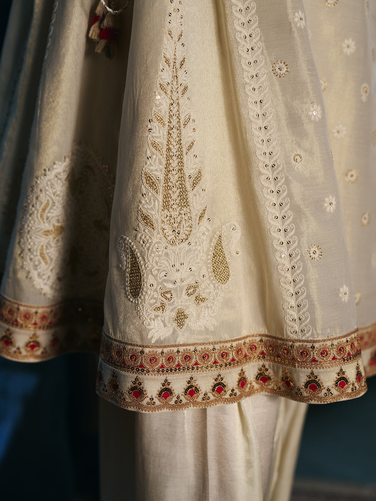Ivory white womens salwar suit with paisley embroidery